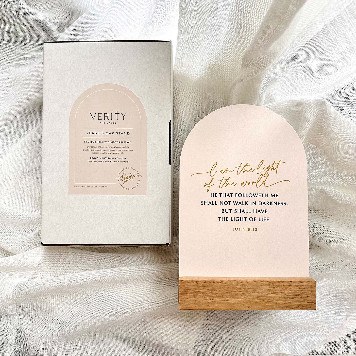 Verity product packaging and light on a soft fabric background