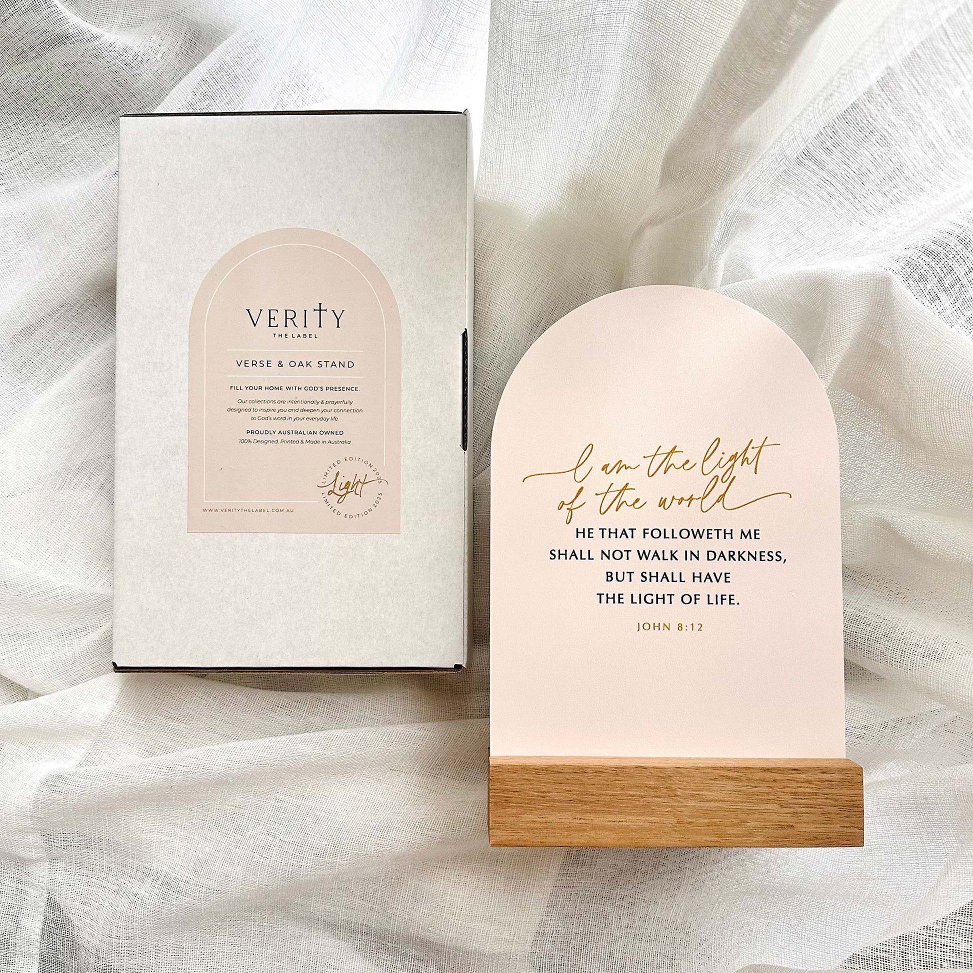 Verity product packaging and light on a soft fabric background