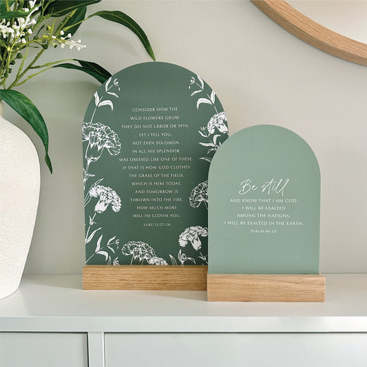 Wildflowers Luke 12 and Be Still Psalm 46 scripture stands with Tasmanian oak bases styled on a white cabinet
